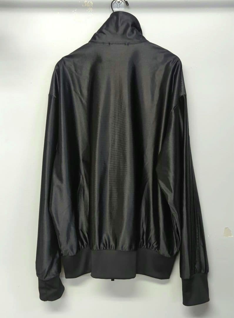 トップス adidas OVERSIZED FIRE BIRD TRACK TOP