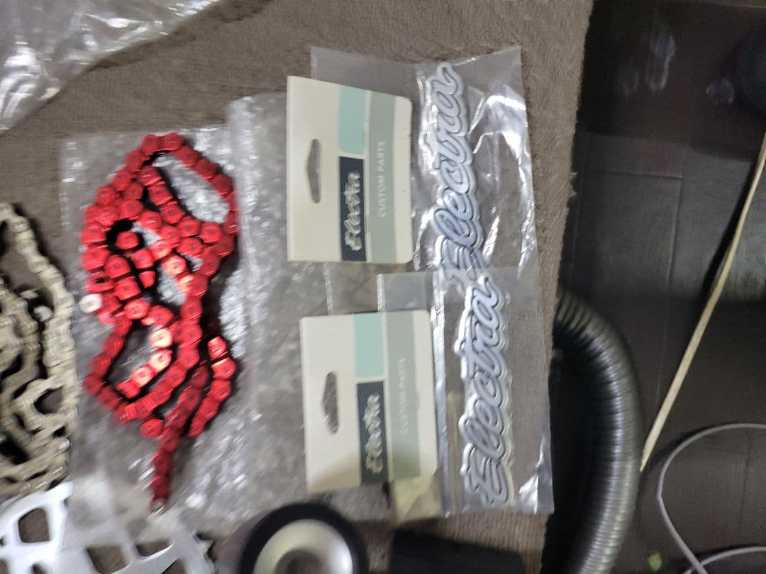 車輪掛け、ハンドルグリップ、自転車持運びカバー、ツェーン