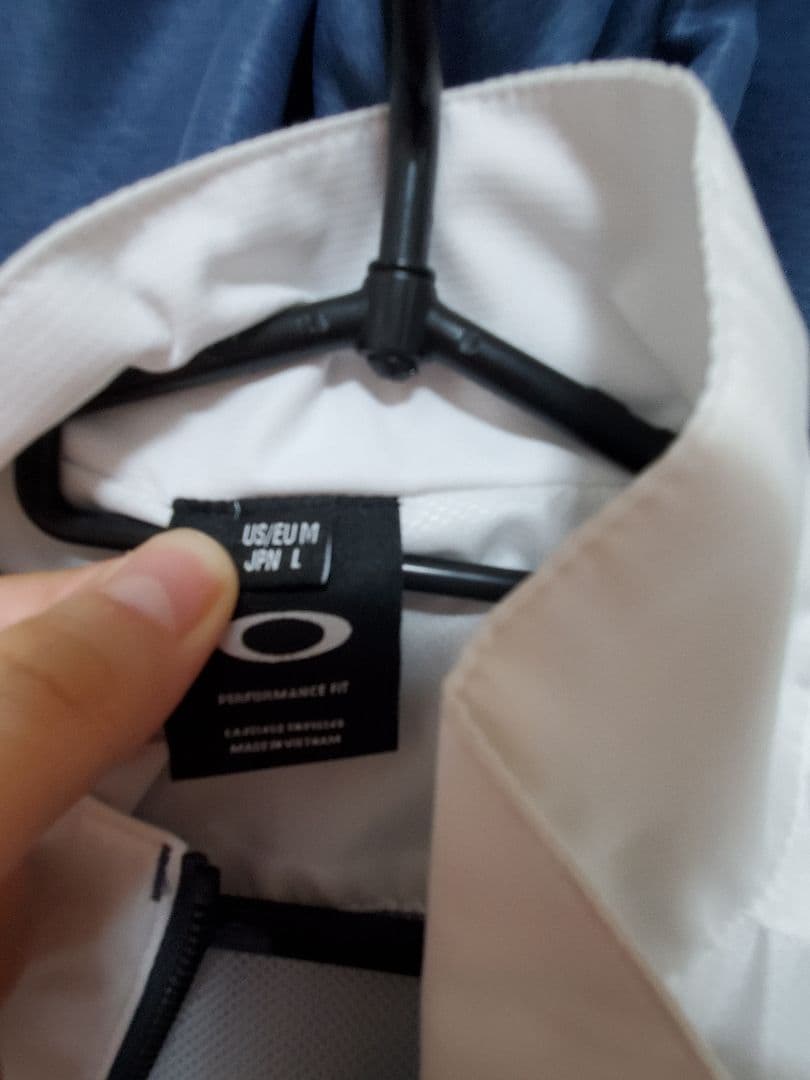 Oakley ホワイトゴルフジャケット メンズウェア
