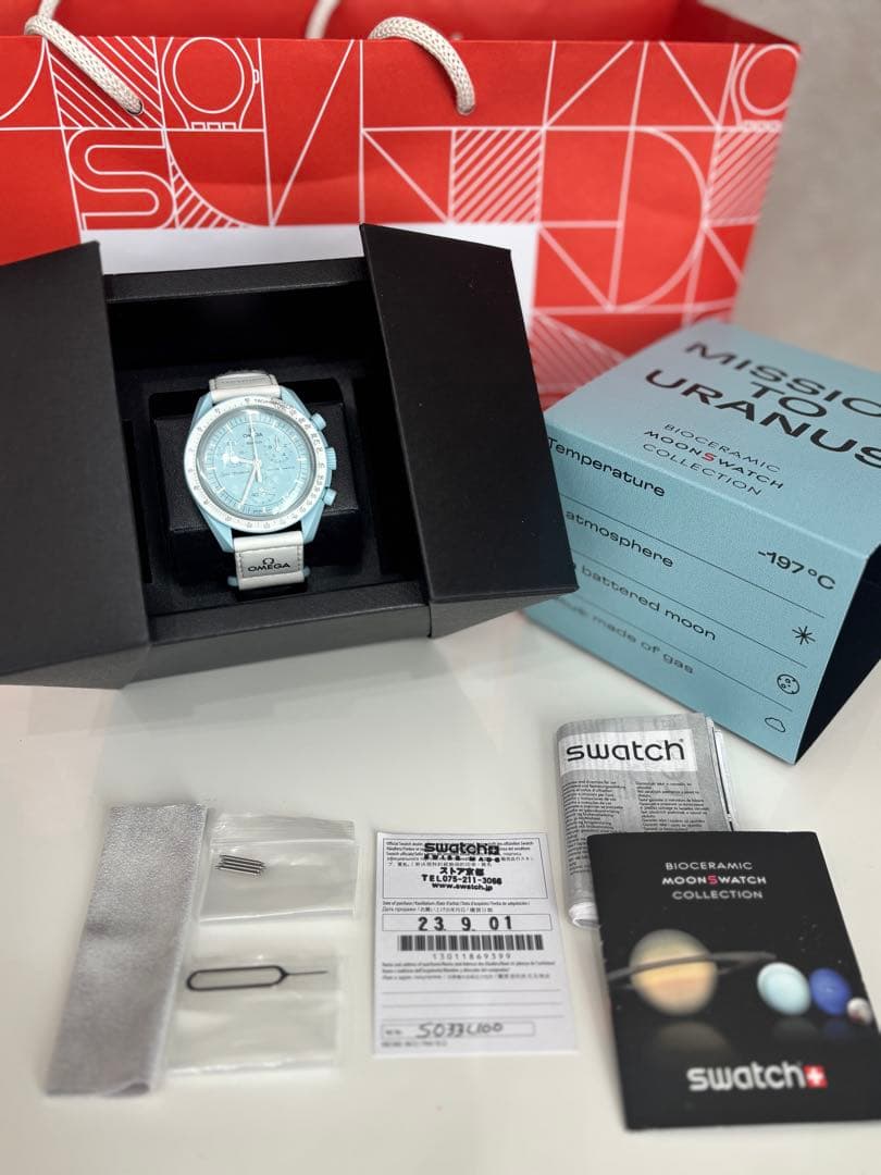 スウォッチ　オメガ　ウラヌス　水色