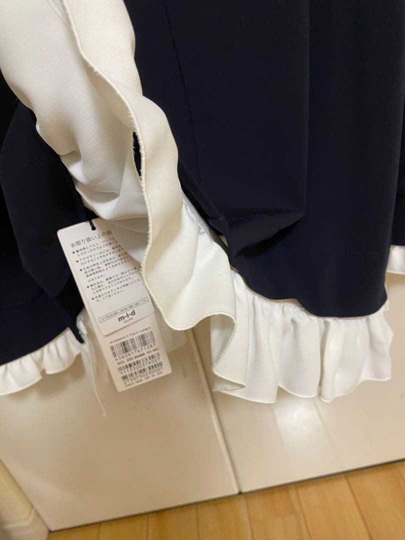 mプルミエ　未使用タグ付きネイビー フリル付き長袖トップス