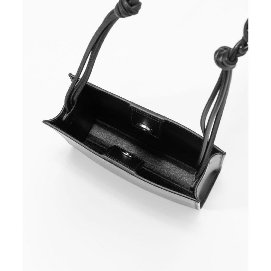 ブラック ショルダーバッグ 合成皮革 編み込みストラップ