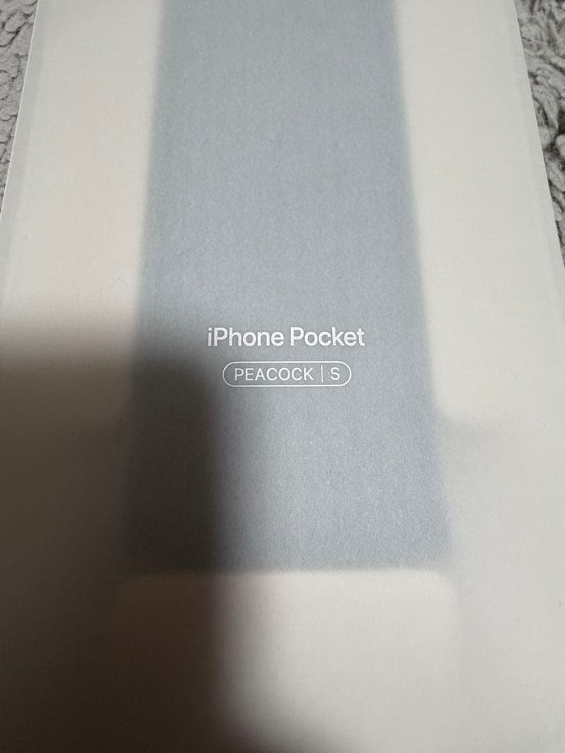 iPhone Pocket by ISSEY MIYAKE ショート　ピーコック