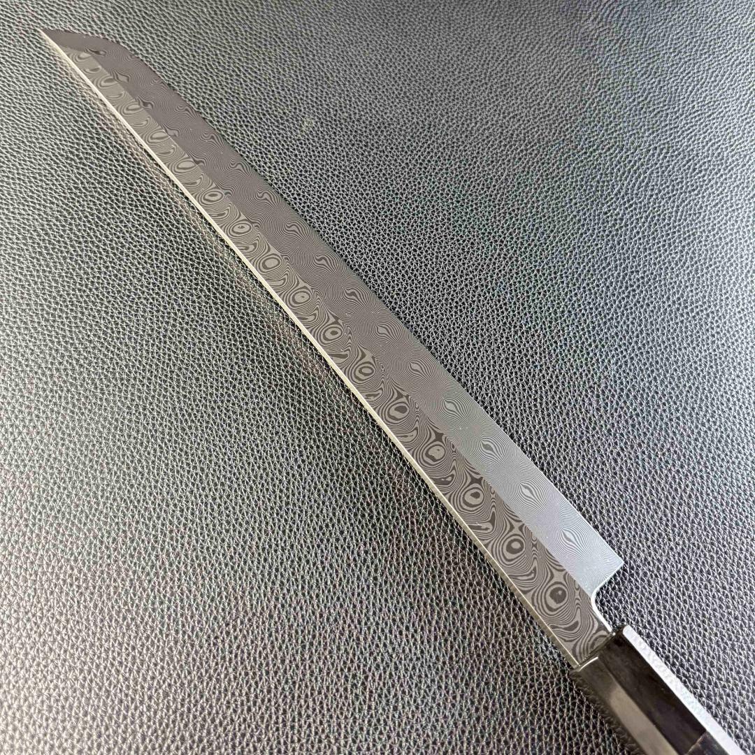 9727新品ダマスカス 先丸包丁 尺一 渦潮紋105層 黒檀黒水牛白三本巻八角柄