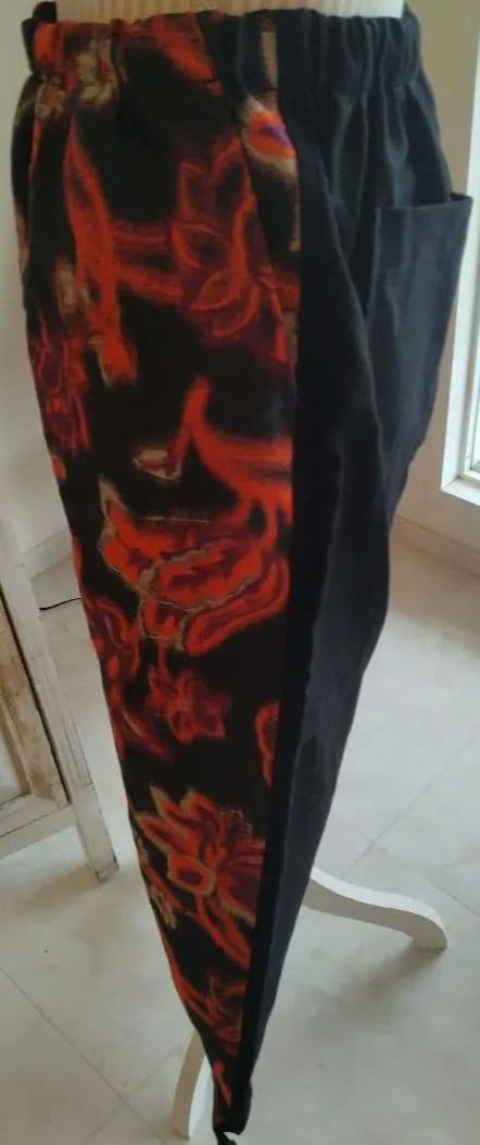 COMME des GARÇONS 黒とオレンジの花柄 ガウチョパンツ