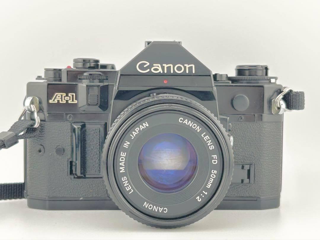 【完動品】　Canon A-1　FD 50mm 1:2 モルト貼替・動作確認済