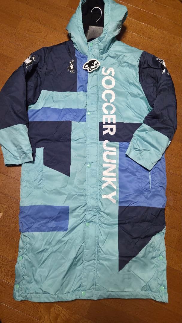新品/未使用【サッカージャンキー　ベンチコート ブルー】中綿ロングコートL