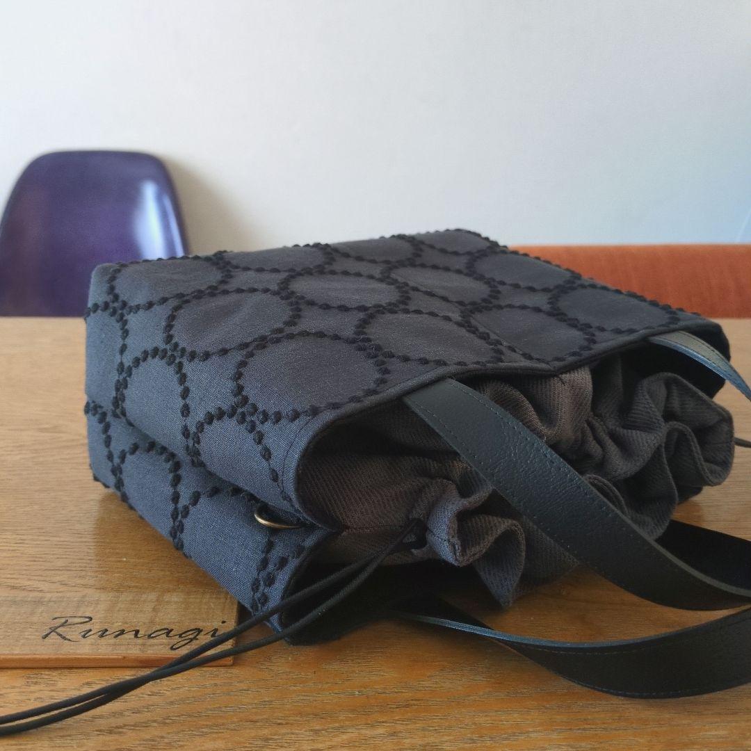 【1566】あおりポケットの巾着バッグ＊ミナペルホネン