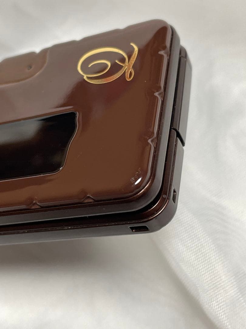 ドコモ　携帯電話　Q-POT SH04C ビスケット　ガラケー 新品電池パック付