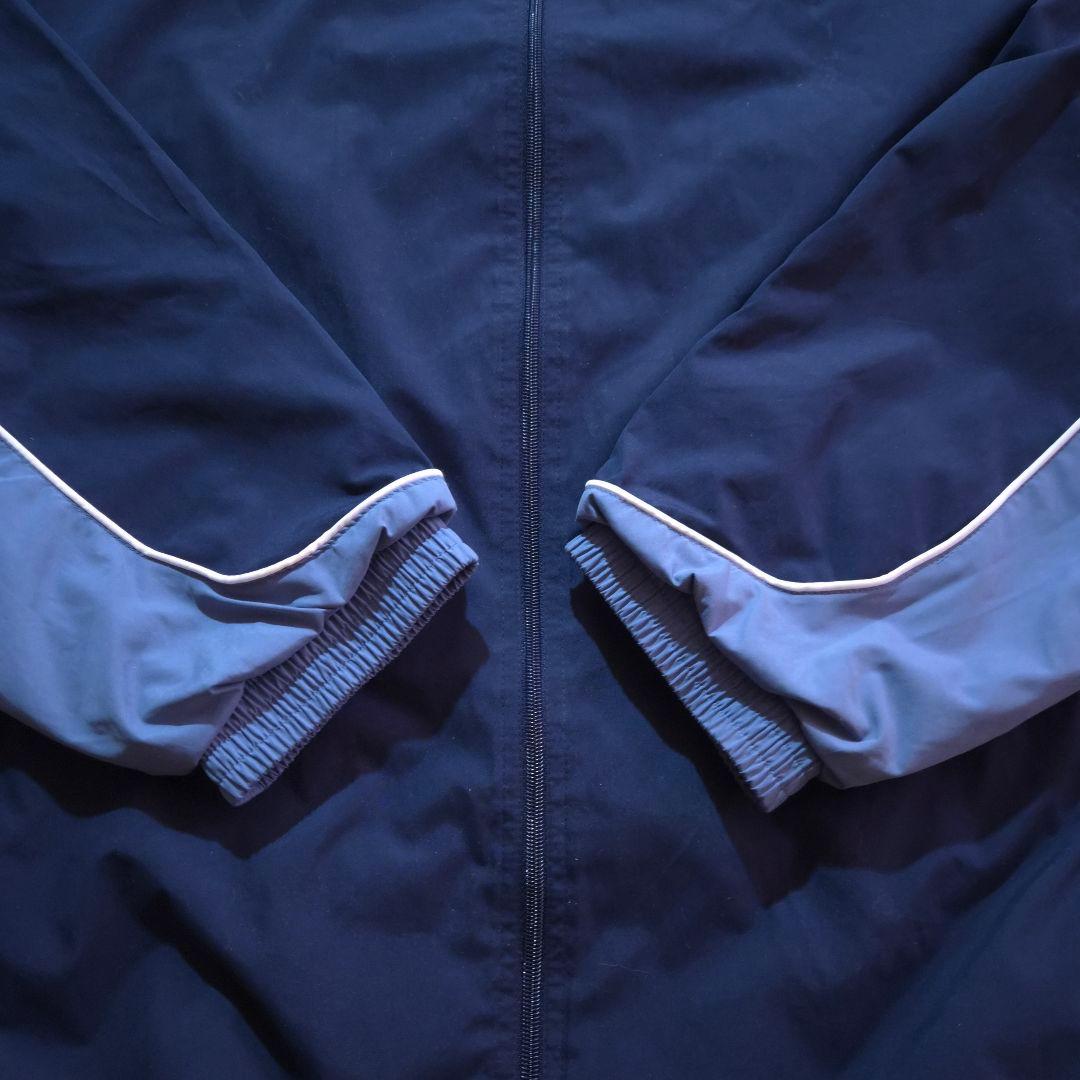 90s Reebokリーボックナイロンジャケット 刺繍ロゴ万国旗タグビッグサイズ