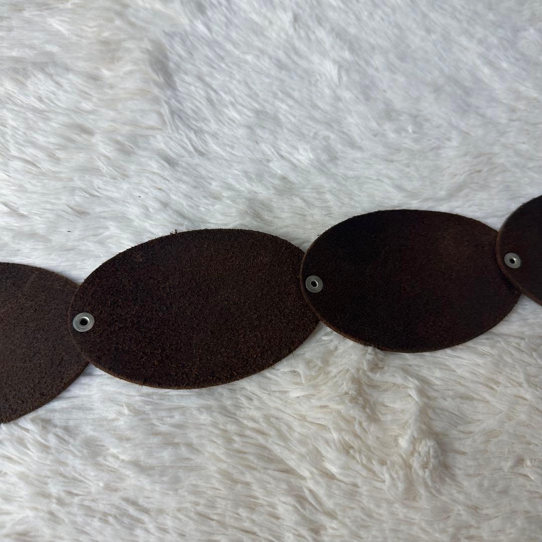 ヴィヴィアン レザーベルト フラワーデザイン オーブ型押印