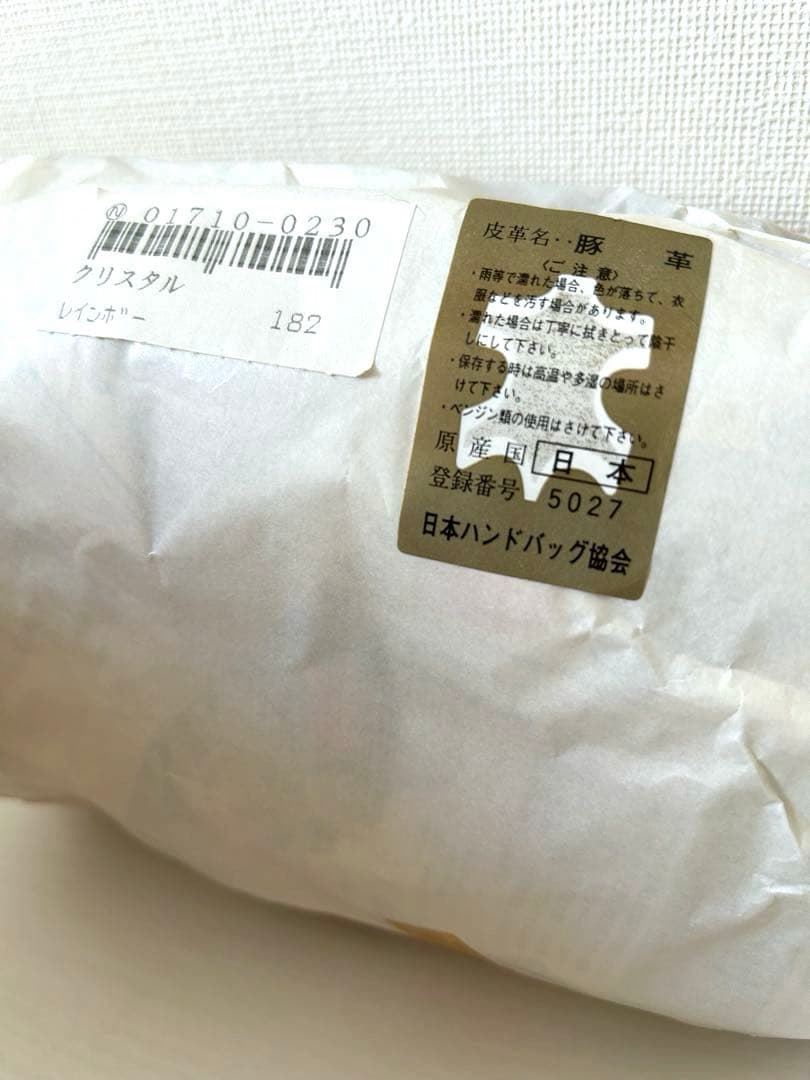 【未使用】ゴールドのハンドバッグ　豚革プレート