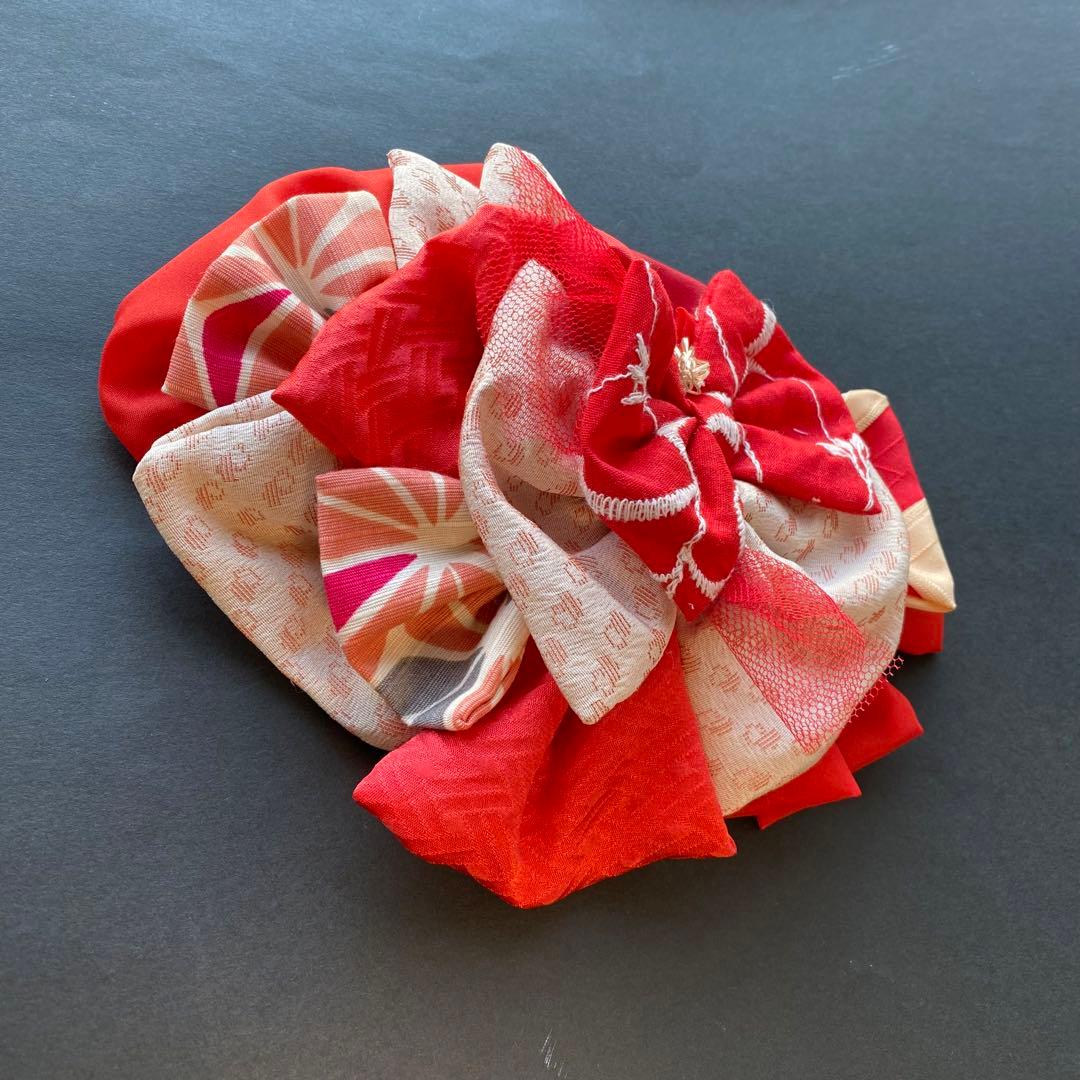 m.y 大きな赤いリボンのヘアアクセサリー とピンクの髪飾り