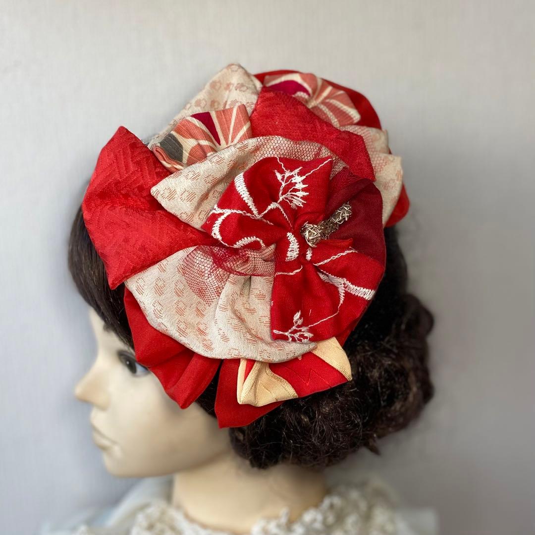 m.y 大きな赤いリボンのヘアアクセサリー とピンクの髪飾り