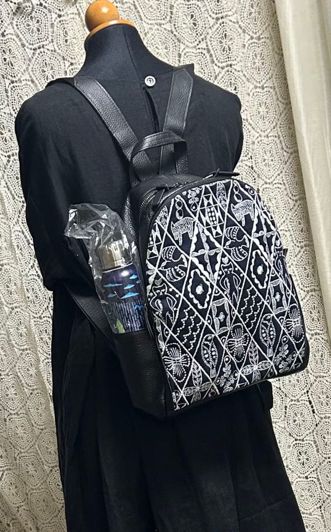 50928A ミナペルホネンハーフハンドメイド本革リュック シンフォニー