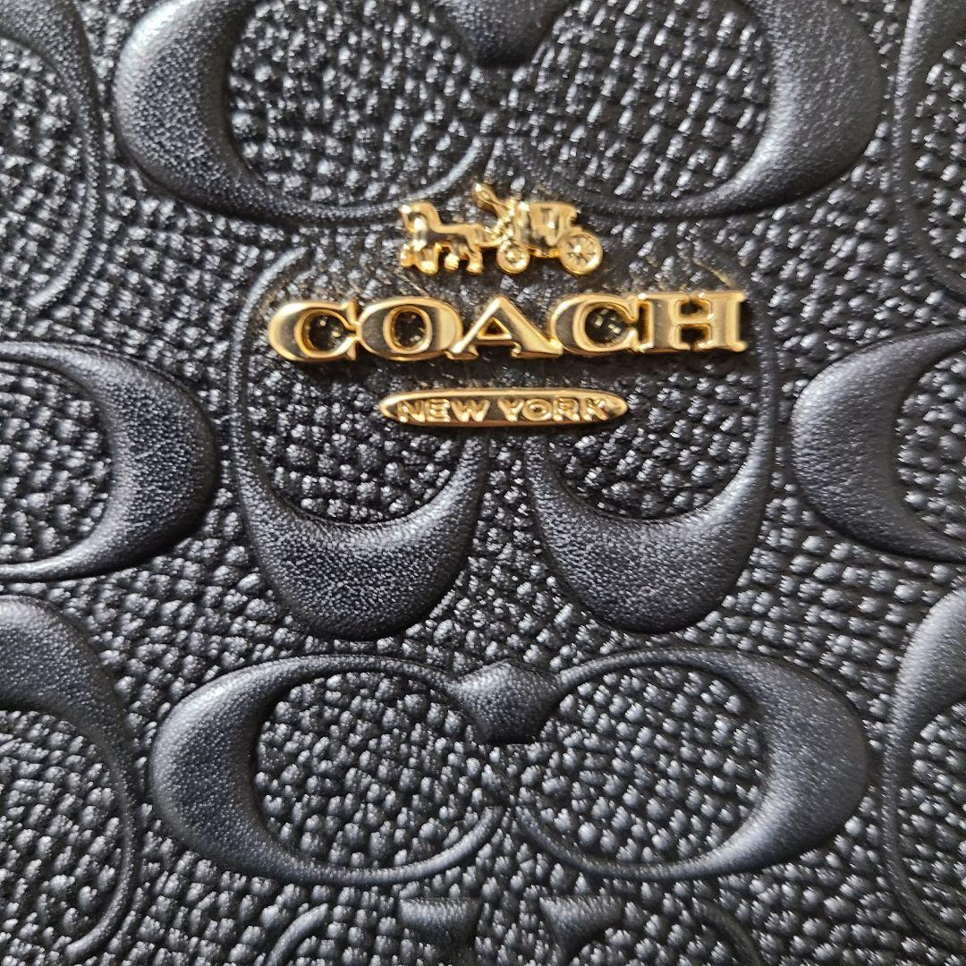 新品未使用 COACH レザー ショルダーバッグ エンボス加工 斜め掛け 黒