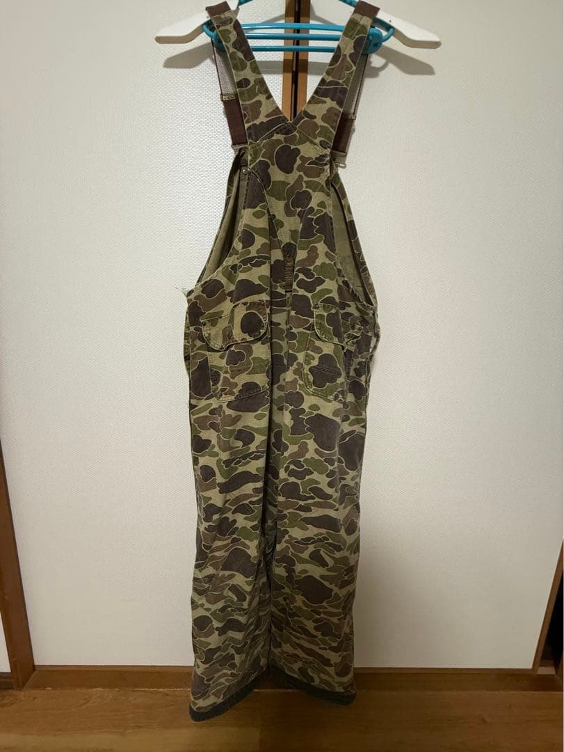 人気のCarhartt カモフラージュ オーバーオール　珍しい