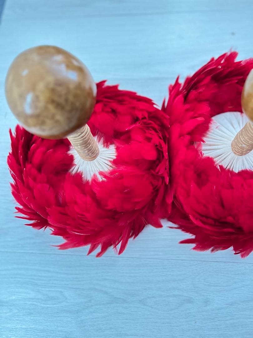 ウリウリ　フラダンス　タヒチアン　赤　羽　黄色　楽器　ハワイ　一体型　２個セット