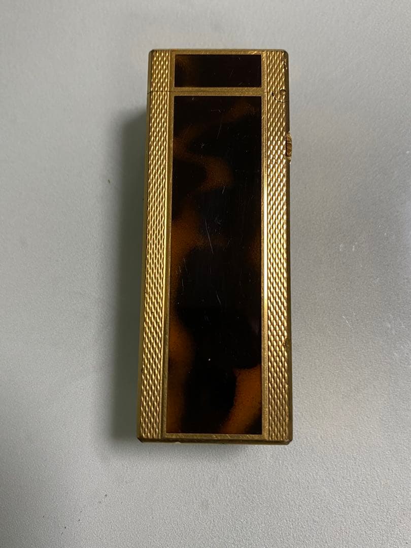 ダンヒルゴールドと茶色のライター本体