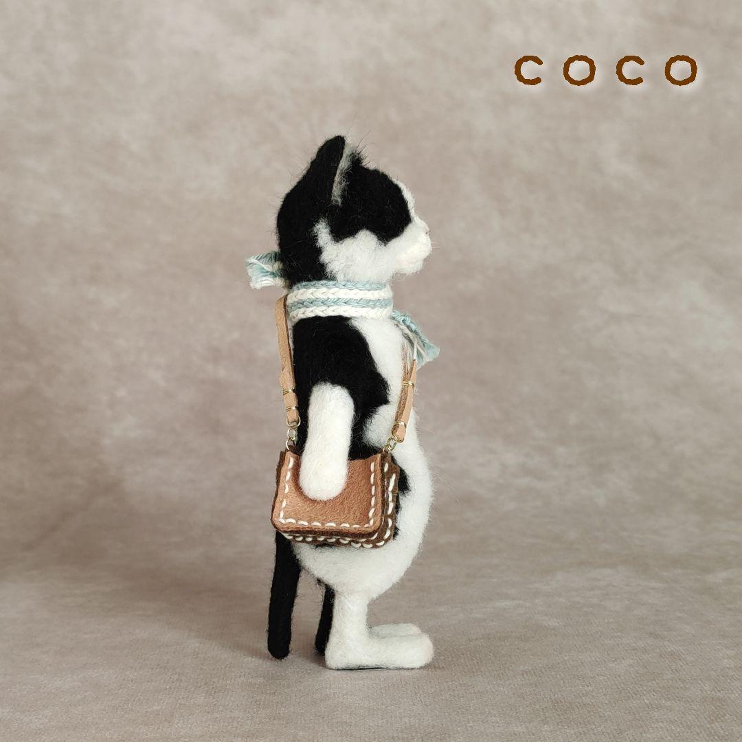 ショルダーバックを下げた小まめさん