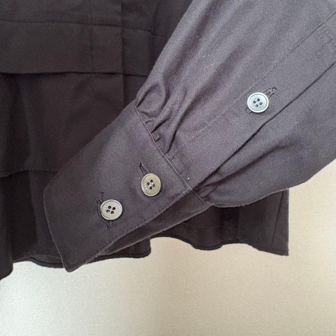 CABaNタイプライターダブルクロス アシンメトリックフリルロングスリーブシャツ