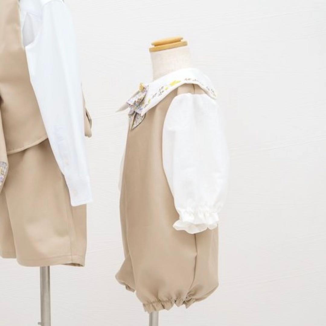 ペンギンのおしり 優しい色を着る ボタニカルロンパース