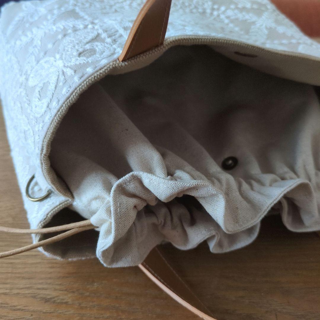 【1560】あおりポケットの巾着バッグ＊ミナペルホネン