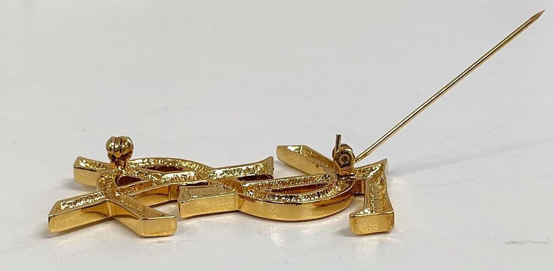 AMH12 イヴサンローラン 美品 カサンドラ YSLロゴブローチ
