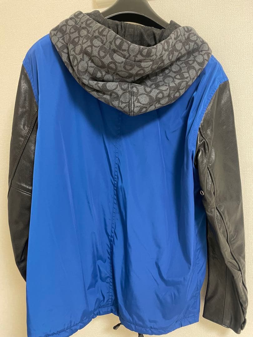 coach × Champion フーディージャケット