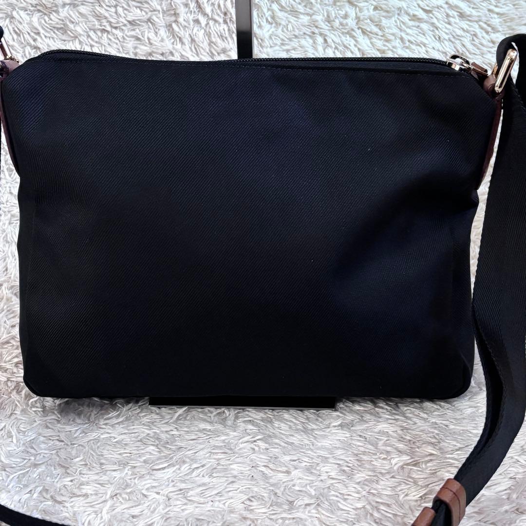 新品同様✨コーチ ショルダーバッグ ブラック ターンロック チャーム 男女兼用