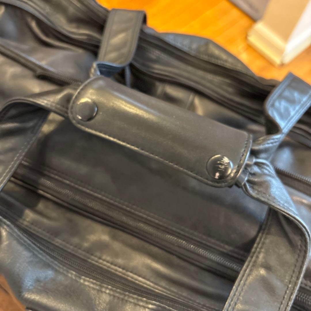 TUMI 革製旅行バッグ