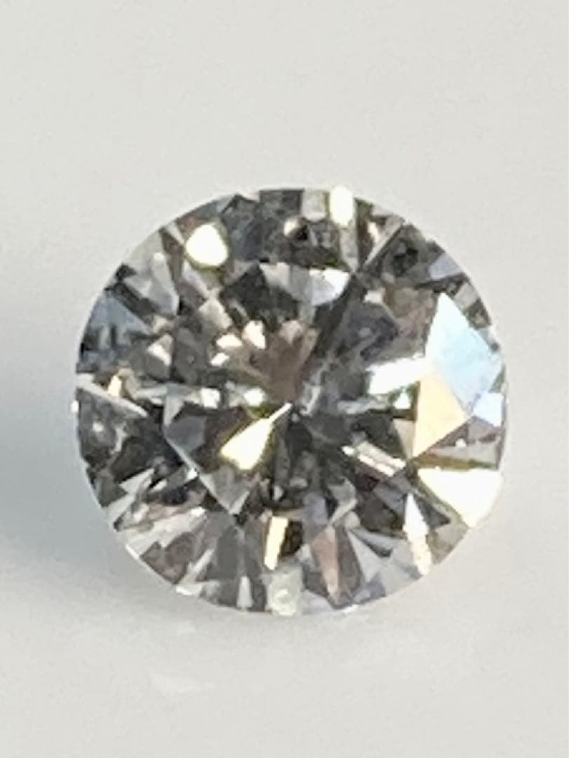 リボン包装　片耳ピアス　０．５ct　 プラチナ　天然ダイヤモンド　鑑定書付き