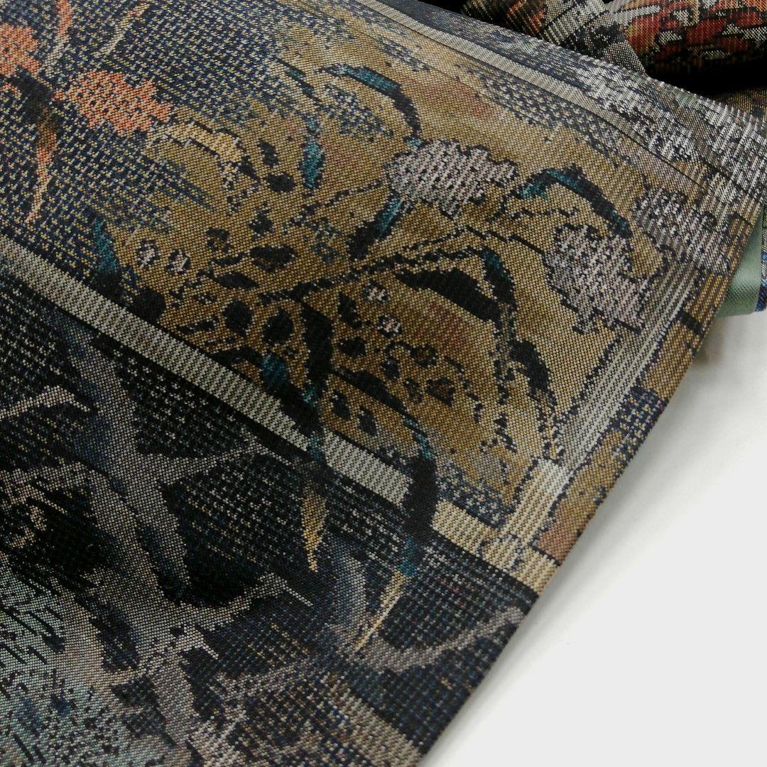 本場大島紬(袷)　(四季の草花紋様　恵 積五郎(絣の魔術師)　裄68㌢身幅広め)