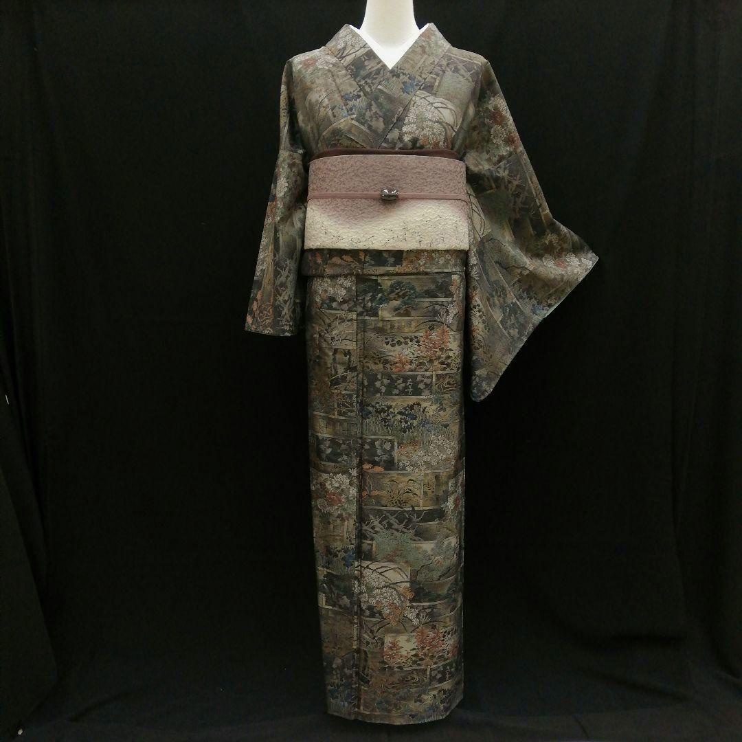 本場大島紬(袷)　(四季の草花紋様　恵 積五郎(絣の魔術師)　裄68㌢身幅広め)