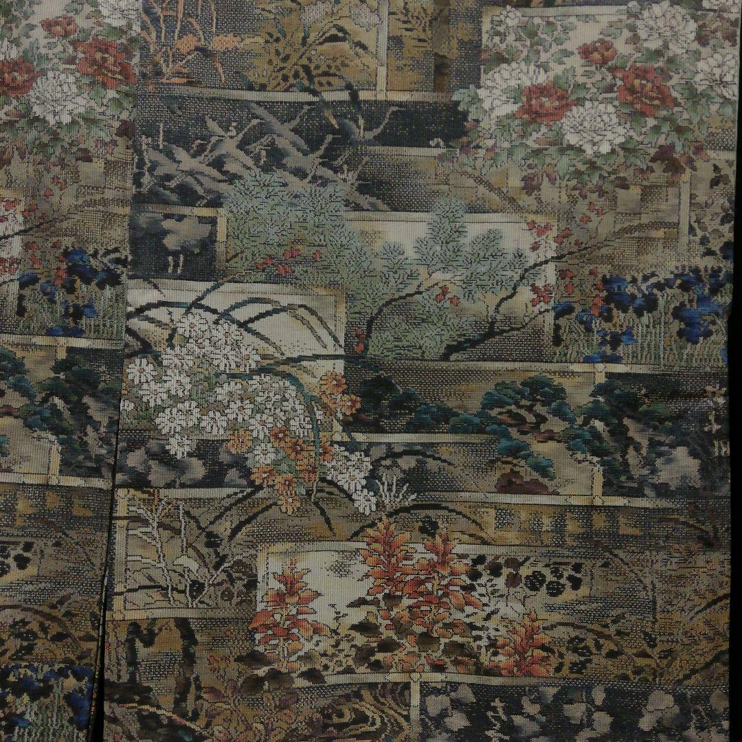 本場大島紬(袷)　(四季の草花紋様　恵 積五郎(絣の魔術師)　裄68㌢身幅広め)