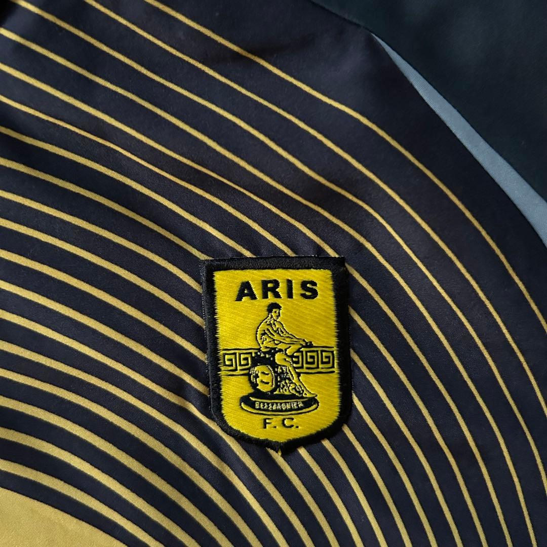 希少adidasアディダスARIS FCナイロンジャケットドローコード刺繍ロゴ