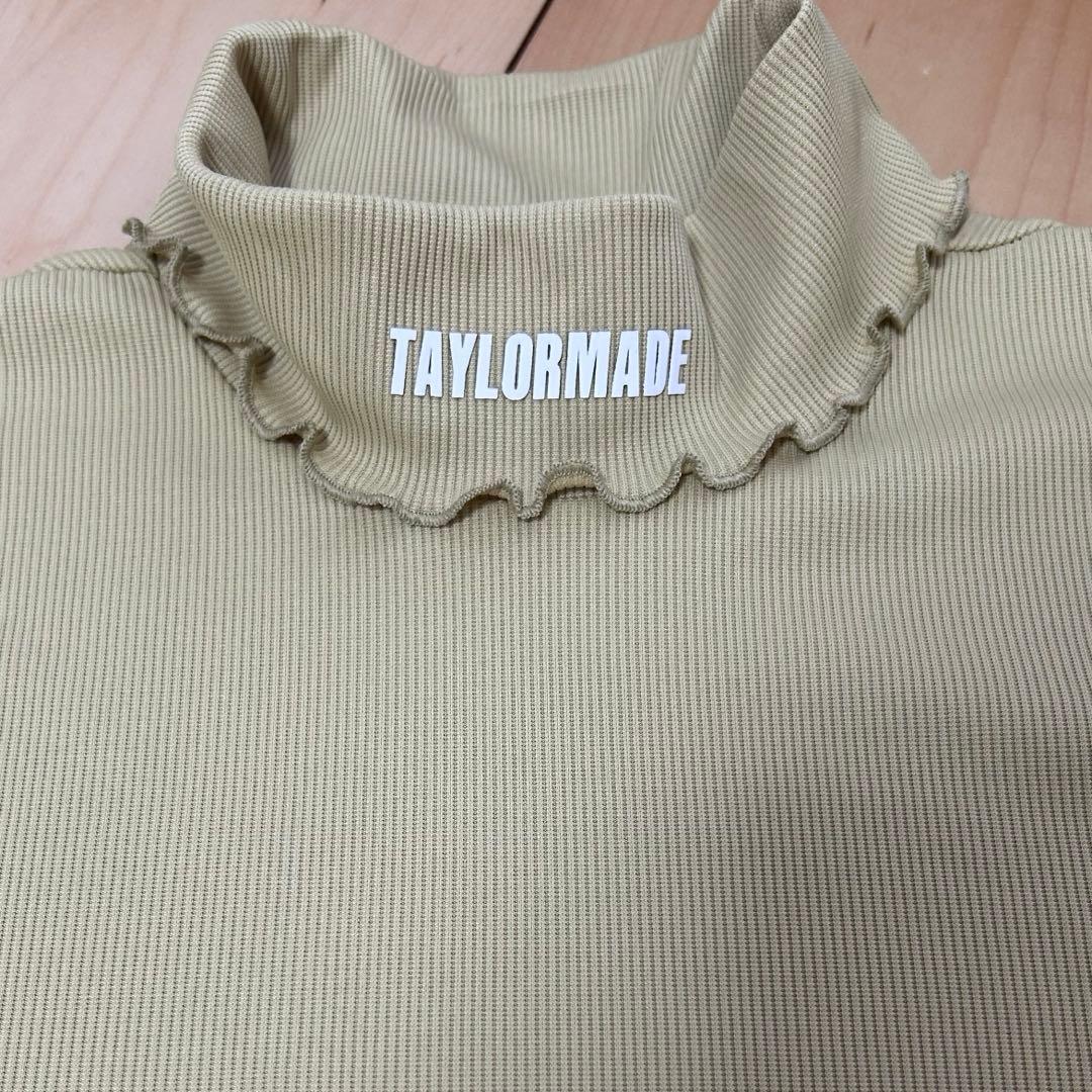 テーラーメイド　フリルハイネック長袖シャツ　クリームイエロー　M