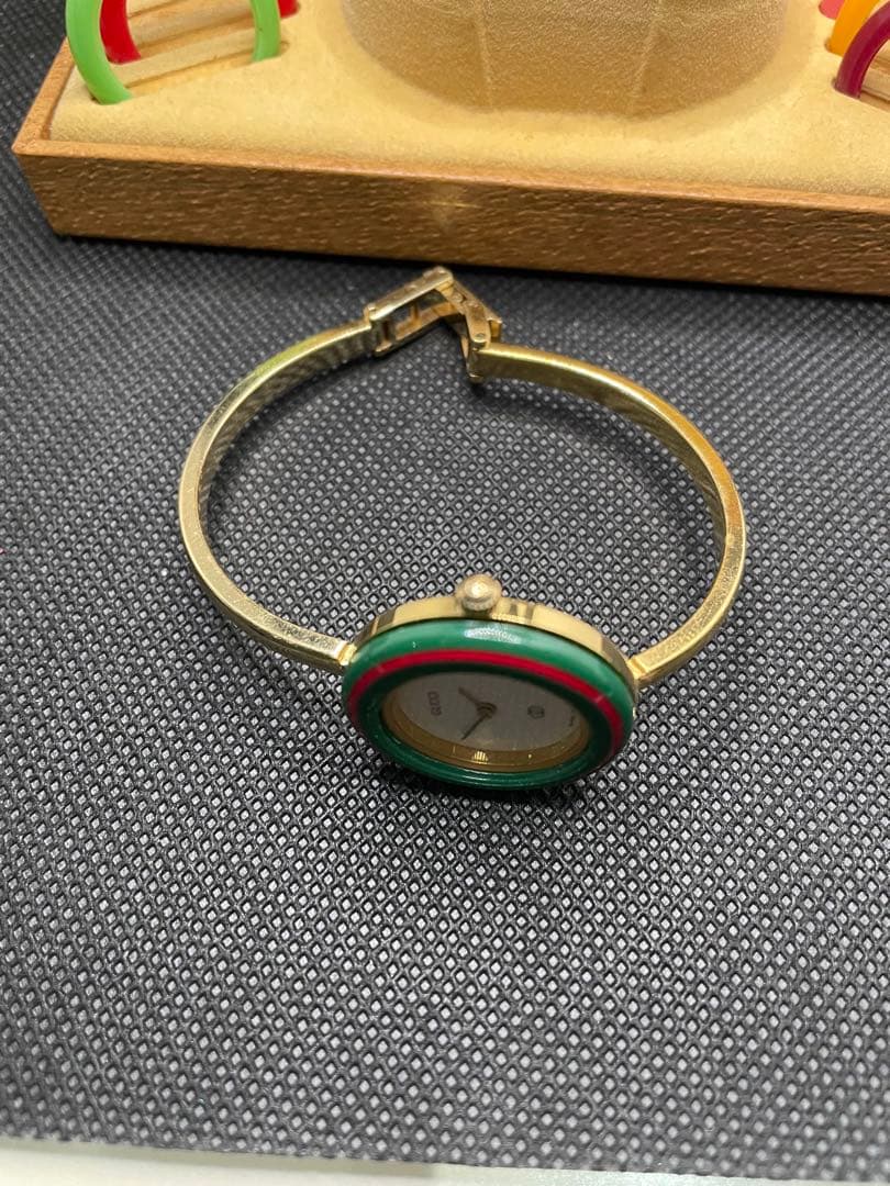 グッチ チェンジベゼル 1100-L ベゼル9個バングルウォッチ ケース付き