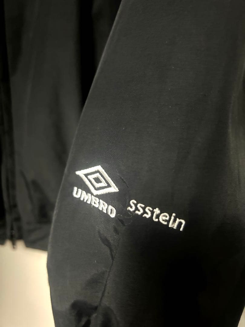 ジャケット・アウター ssstein UMBRO CO/NY POPLIN PADDED JACKET