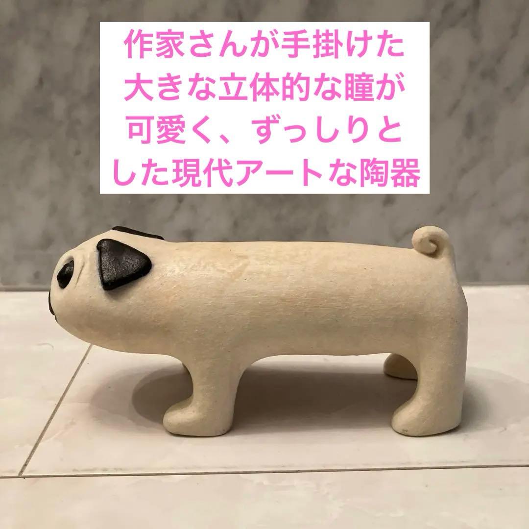 作家さんが手掛けた大きな立体的な瞳が可愛すぎる、ずっしりとした現代アートな陶器