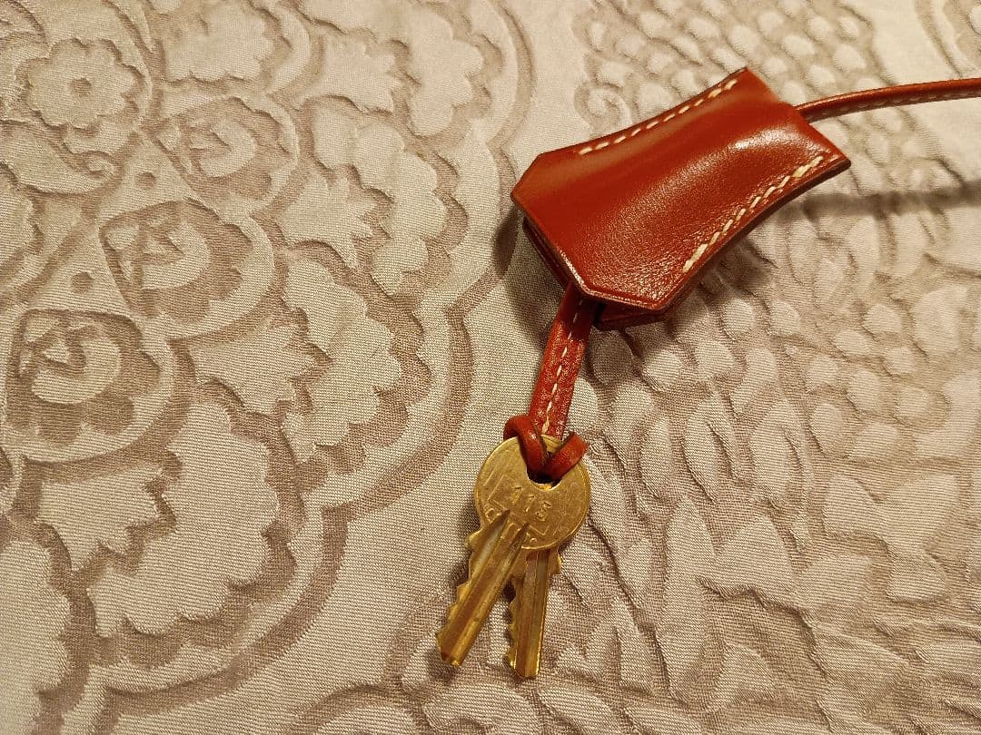 エルメス ケリーバッグ バーガンディ色の付属品 カデナ、クロシェット、鍵