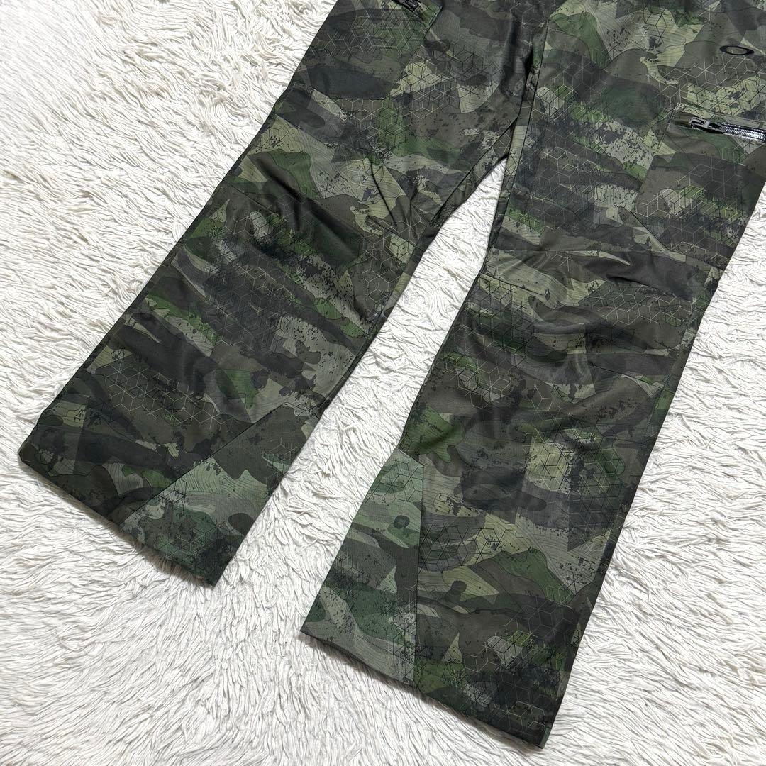 極美品 オークリー 幾何学迷彩 シェルパンツ スノーボード スキー Mサイズ