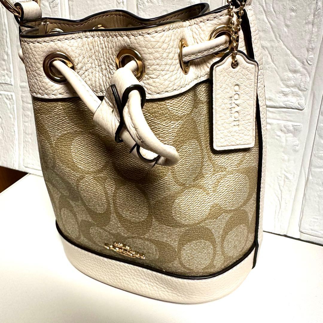 n*o様 【美品】コーチシグネチャー コーテッド キャンバス、リファインド ペブ