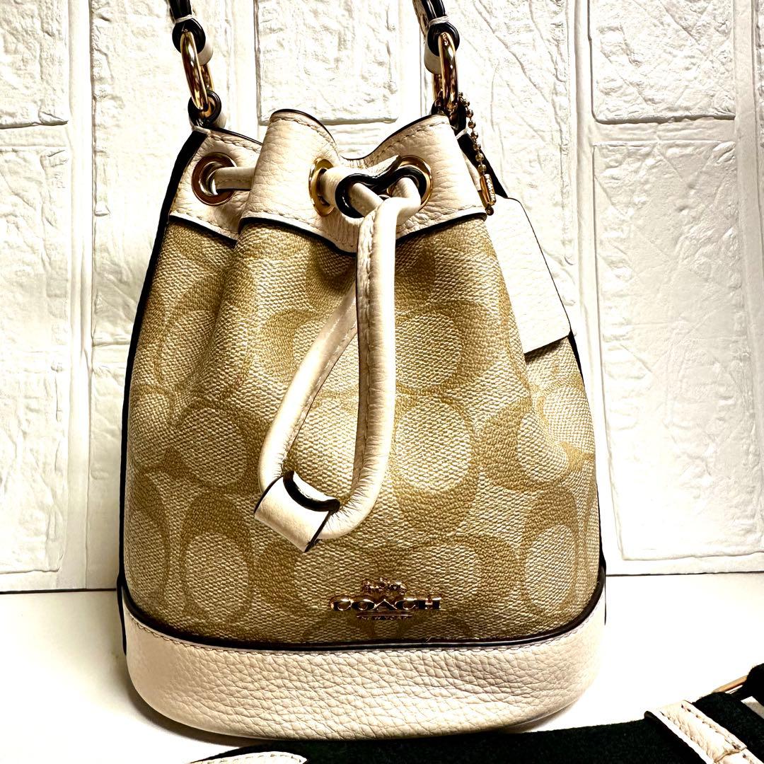 n*o様 【美品】コーチシグネチャー コーテッド キャンバス、リファインド ペブ