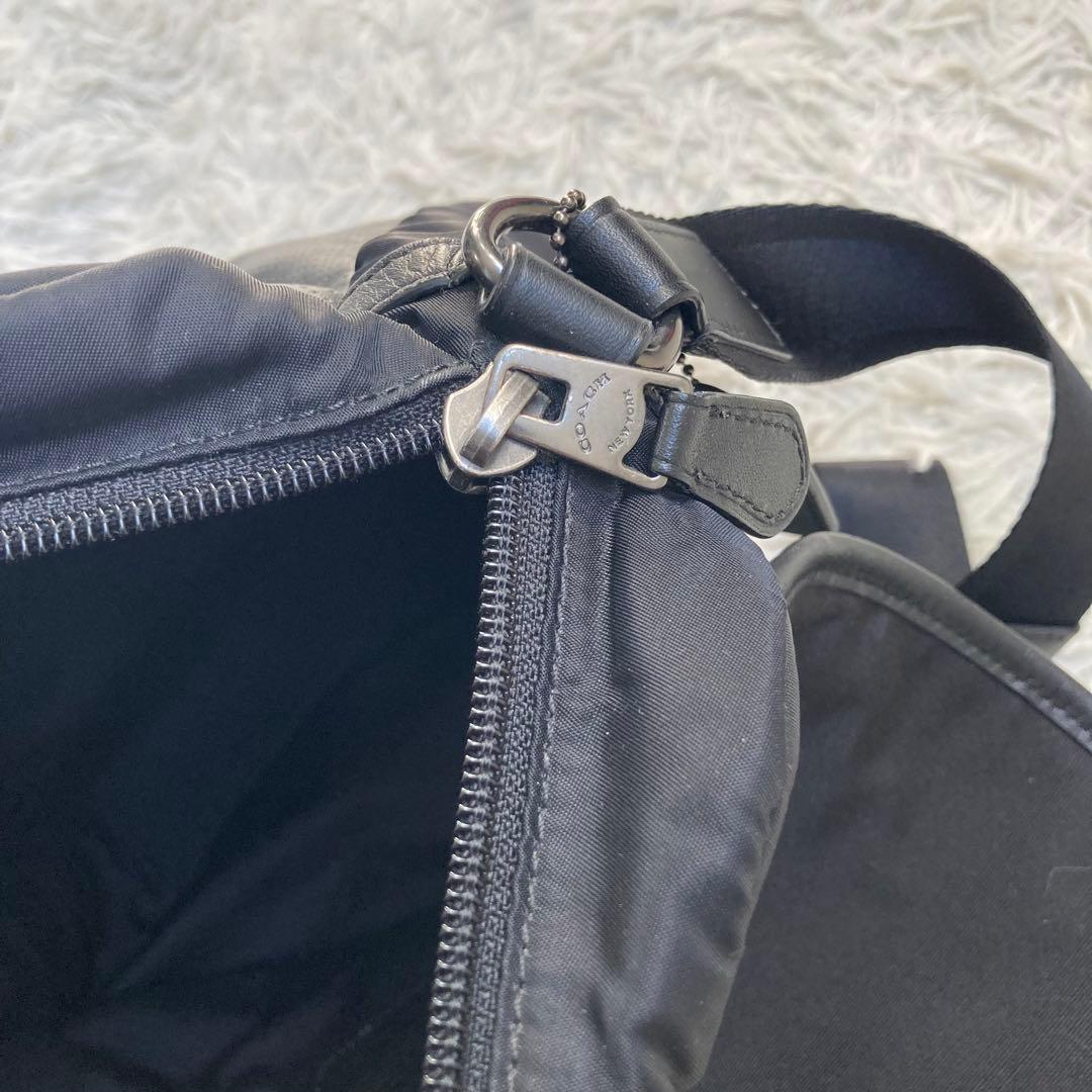 COACH フライトバッグ 黒 ブラック パンチング レザー 革 バックル