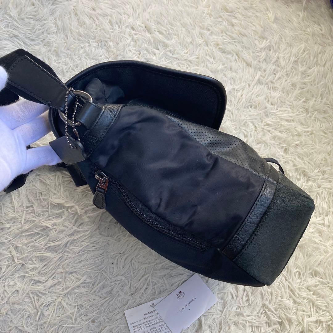 COACH フライトバッグ 黒 ブラック パンチング レザー 革 バックル