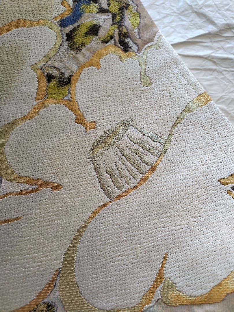 UniUni値下げ　織匠　万勝　琳派椿葉樹文　春繭　袋帯