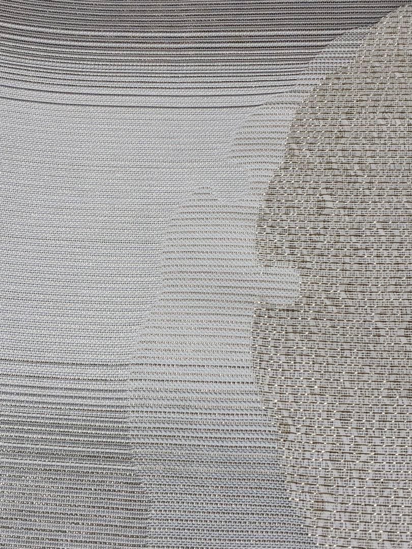 粋でモダンな装い！西陣全通名古屋帯 綿芯本仕立ガード加工済　雪輪文 簡易包装