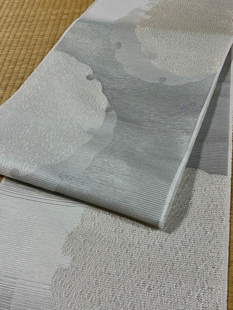 粋でモダンな装い！西陣全通名古屋帯 綿芯本仕立ガード加工済　雪輪文 簡易包装