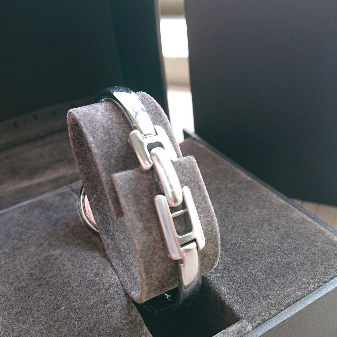 GUCCI timepieces バングルウォッチ黒文字盤 ラウンド 1400L